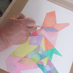 Participants work on their abstract geometric watercolour painting